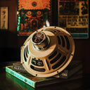 Vintage-style radio on a stand with neon sign in the background