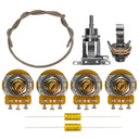 All of the components included in the unassembled ES-335 style wiring kit. This includes parts such as CTS 500K vintage taper short shaft 7% tolerance potentiometers, a Switchcraft short straight toggle switch, a Switchcraft mono input jack, Mojotone dijon .022uF capacitors, and three feet of shielded cloth covered 22 gauge black wire.