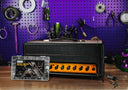 guitar amp and amp kit on a workbench and guitar tools